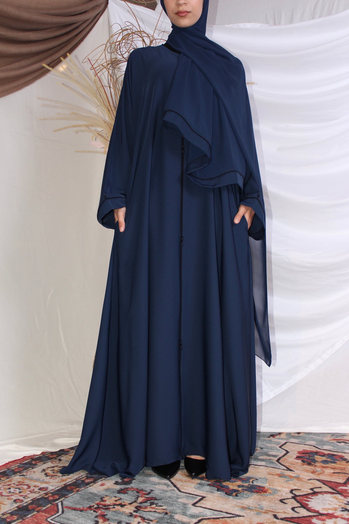 Full-length view of the Isha flowing modest abaya