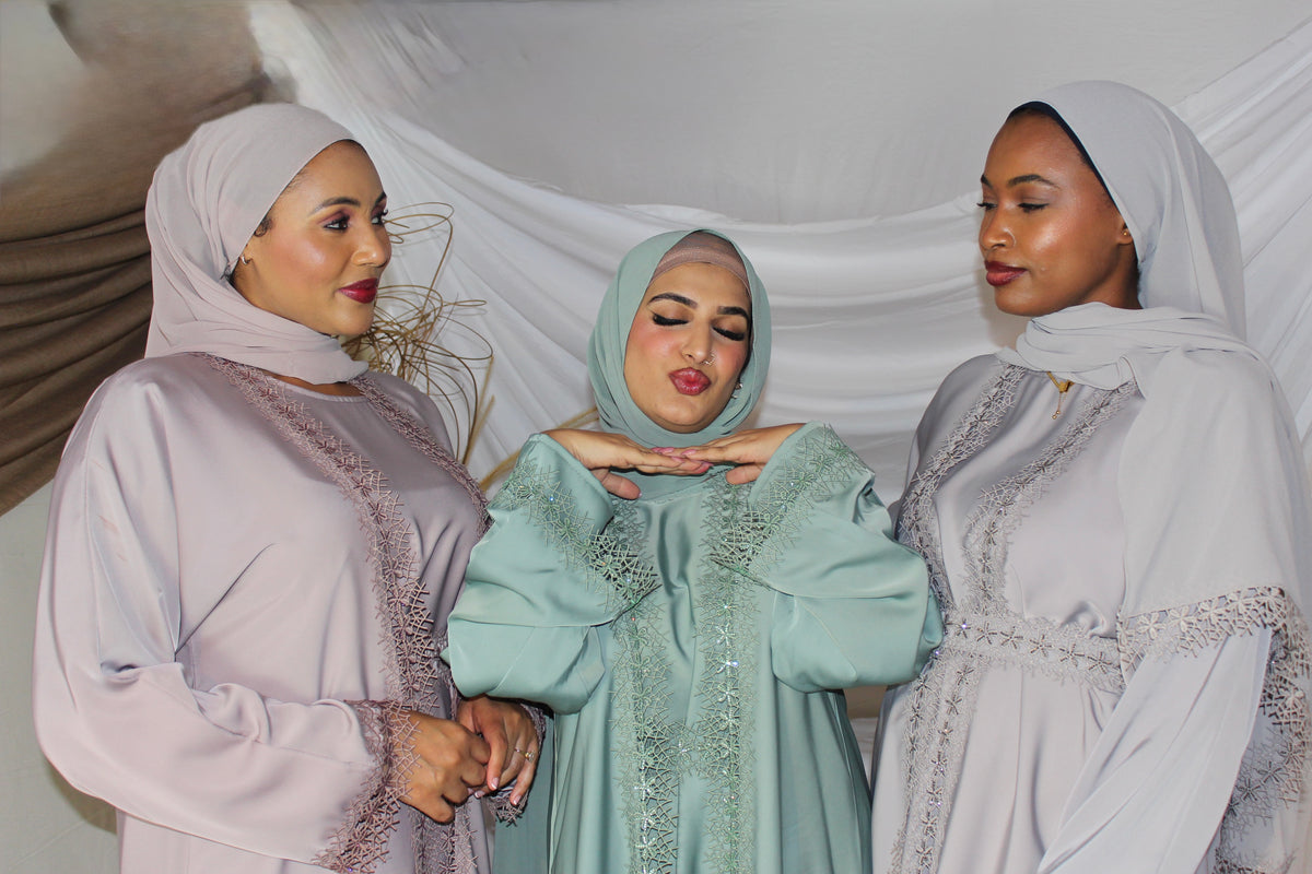 Detailed lace border on the front edges of Latifah abaya
