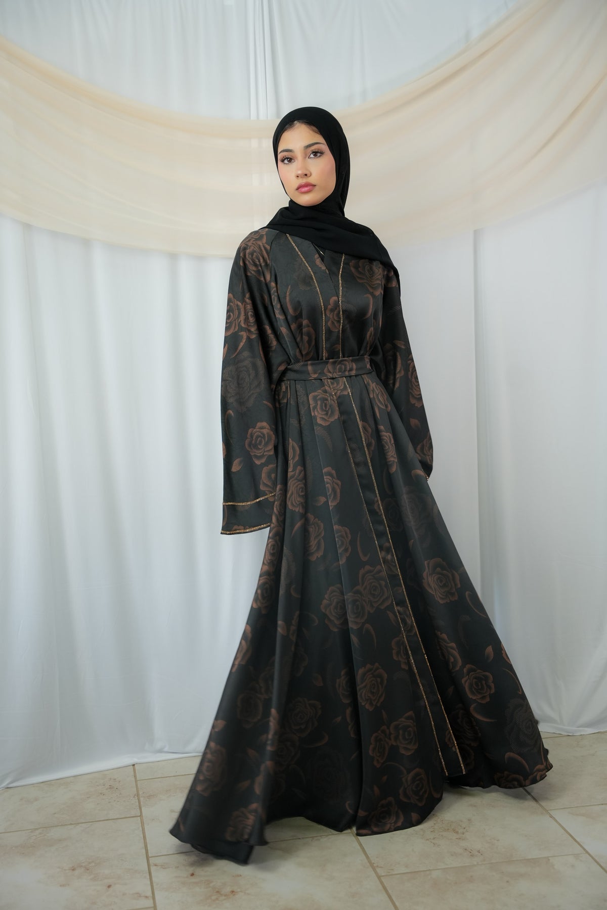 Warada full-length floral satin abaya with flowing silhouette