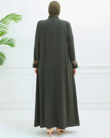Zeenat abaya showcasing its long silhouette and relaxed modest fit