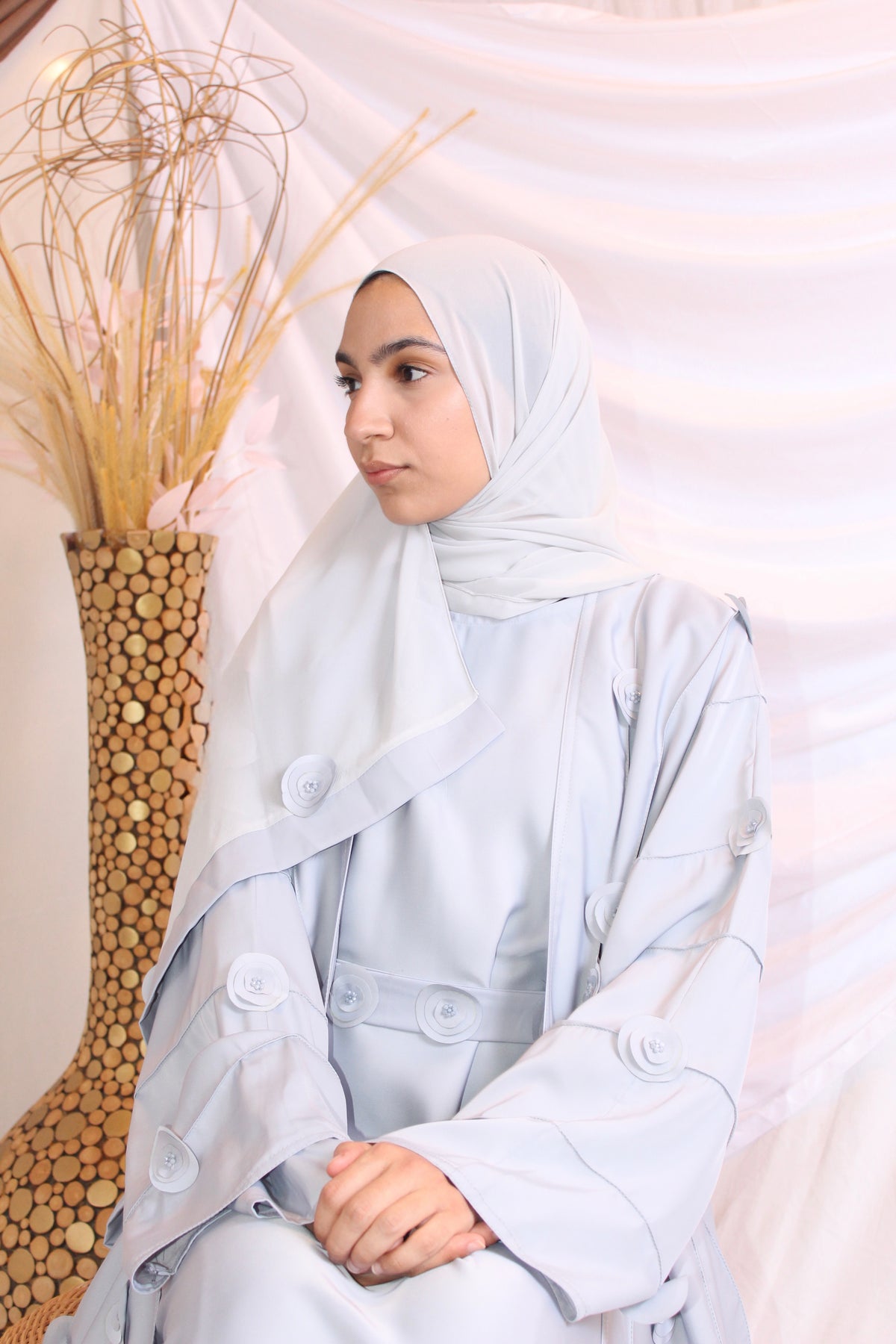 Handworked floral details on the front of Bushra abaya
