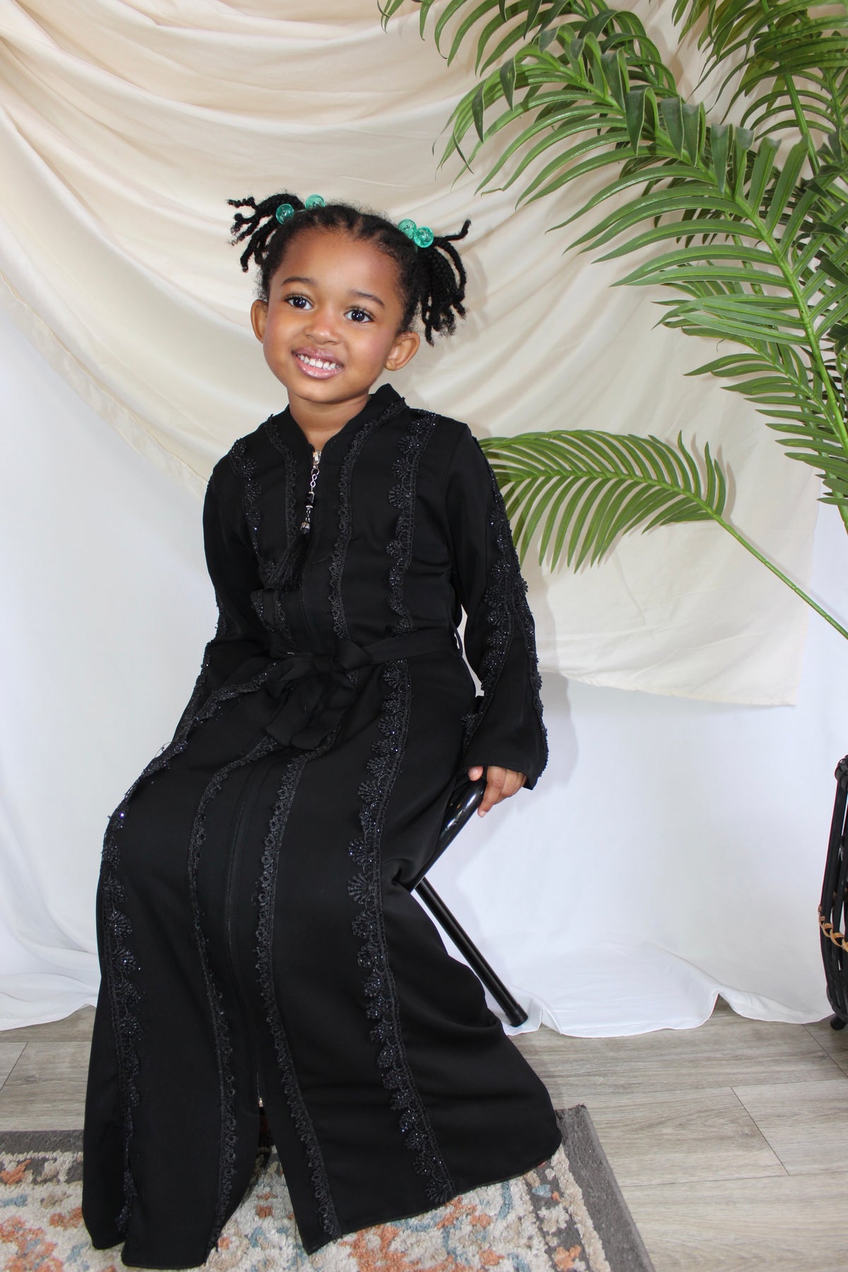 Enaaz abaya with a sleek design and relaxed modest fit
