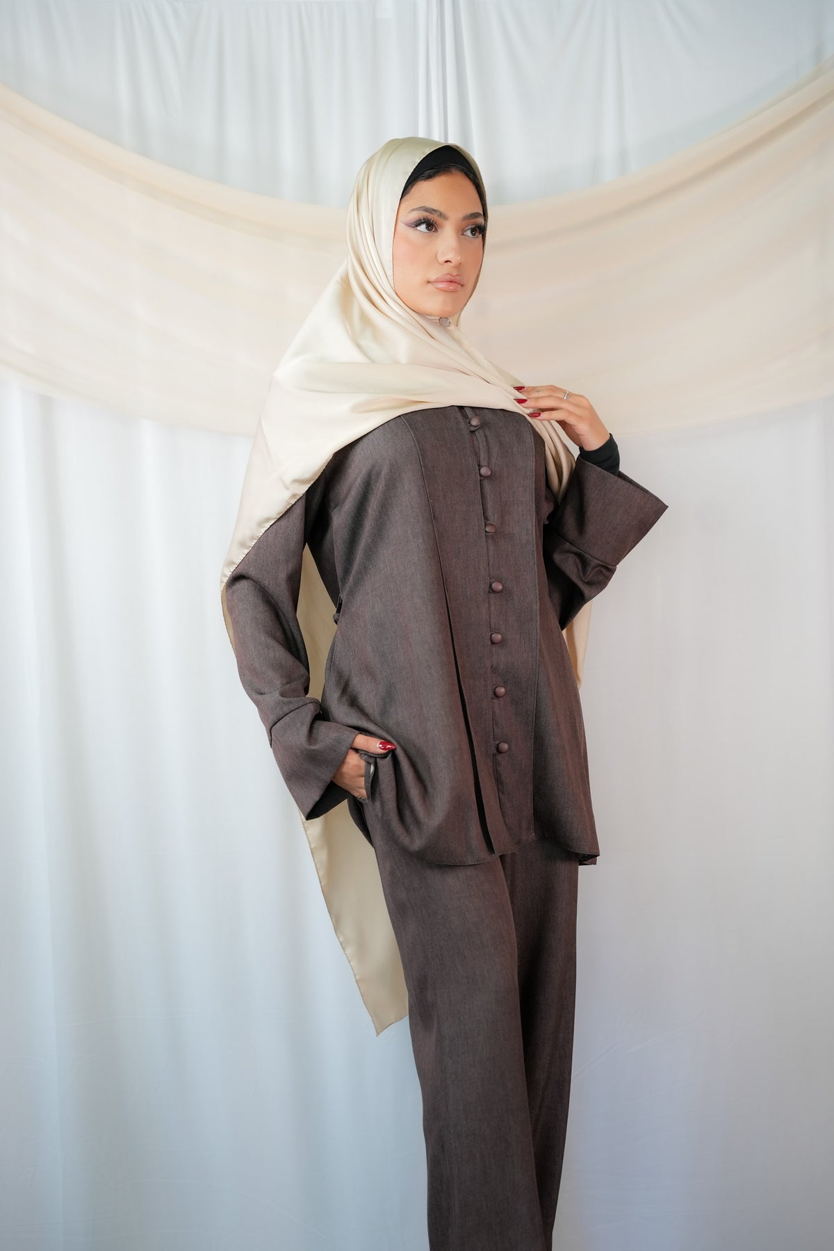 Mulikat longline tunic top with structured fabric-covered buttons